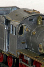 Modifications to cab front and roof to portray 38 1182